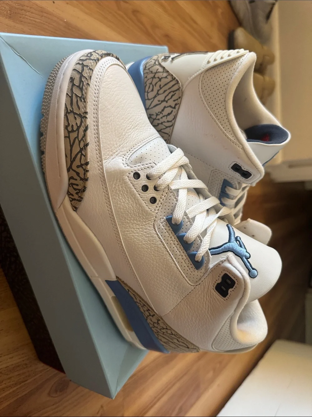 Jordan White and Light Blue Retro Sneakers